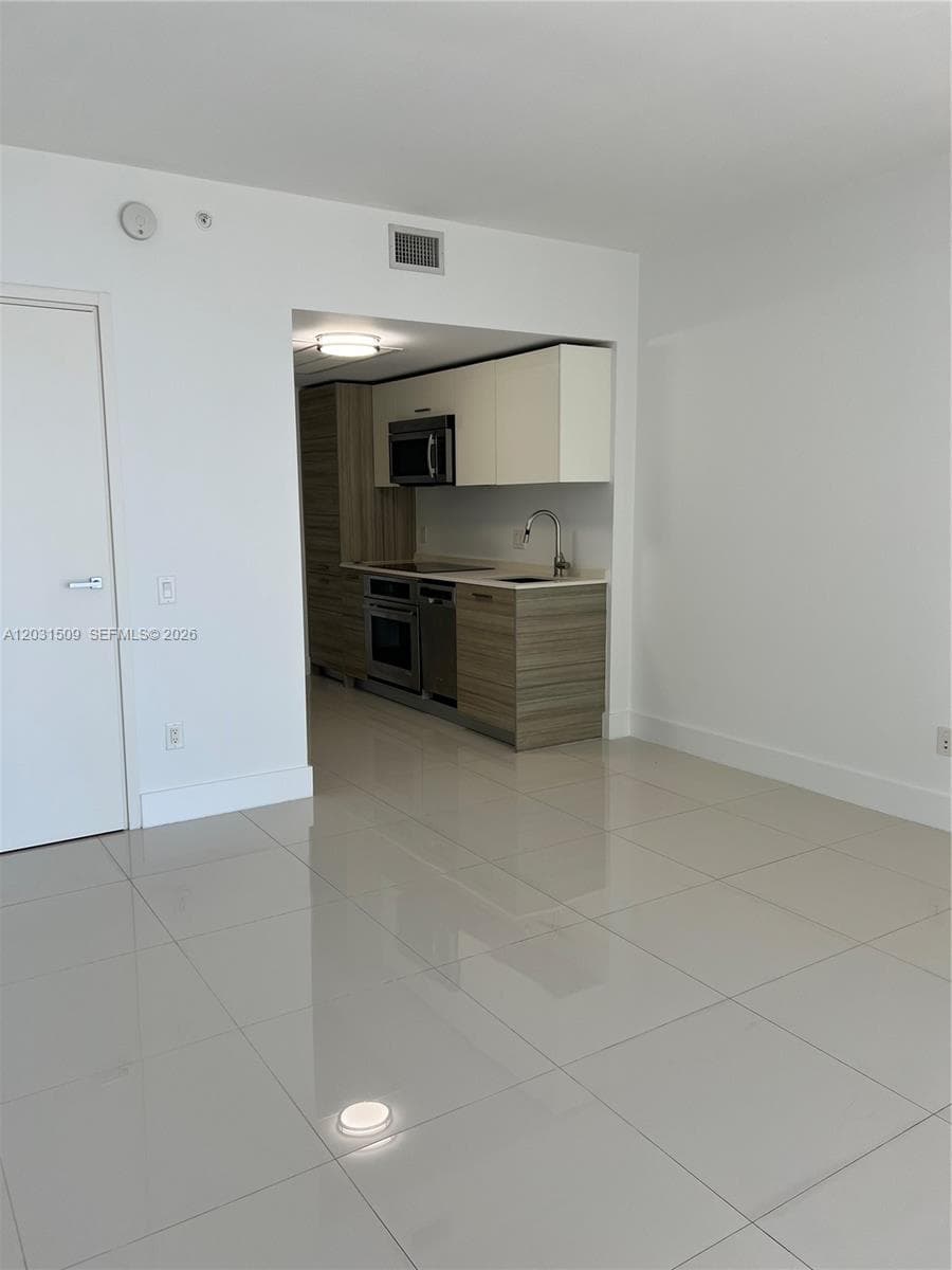 1300 Brickell Bay Dr # 1606, Miami FL 33131 — 5