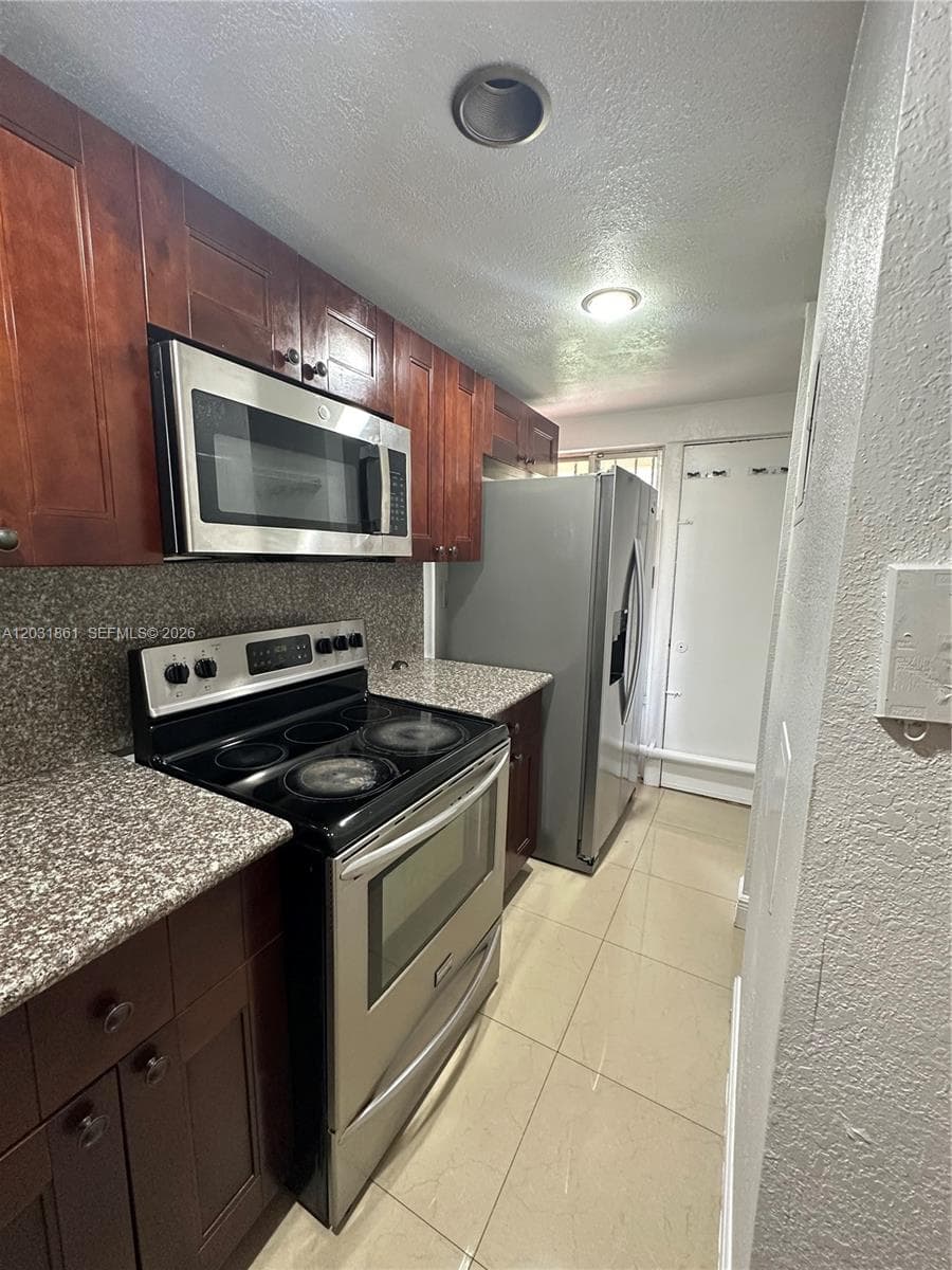 9250 Fontainebleau Blvd # 202, Miami FL 33172 — 12