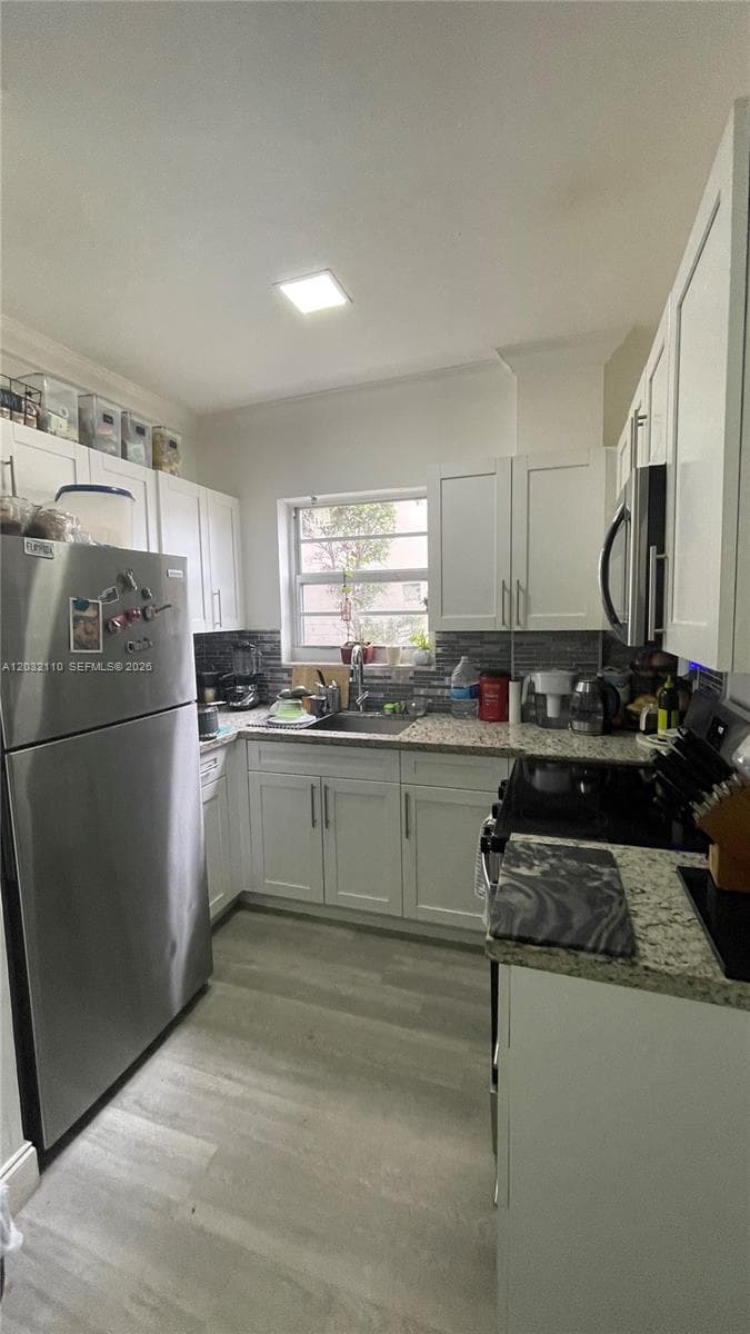 1043 NW 2nd St # 2, Miami FL 33128 — 16