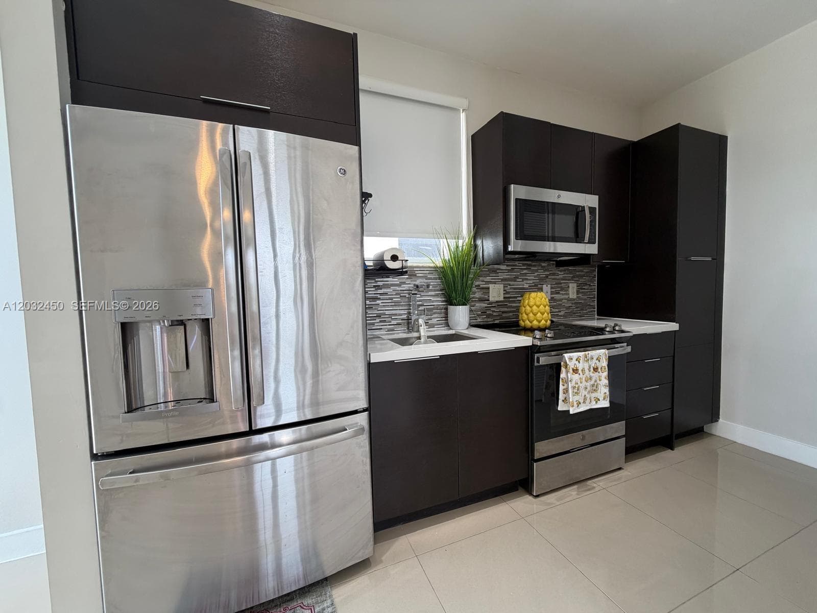 6440 NW 103rd Psge # 6440, Doral FL 33178 — 1