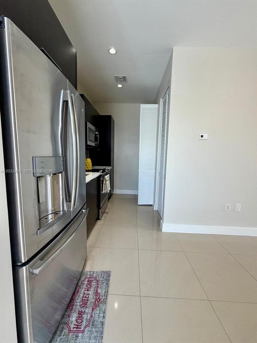 6440 NW 103rd Psge # 6440, Doral FL 33178 — 5