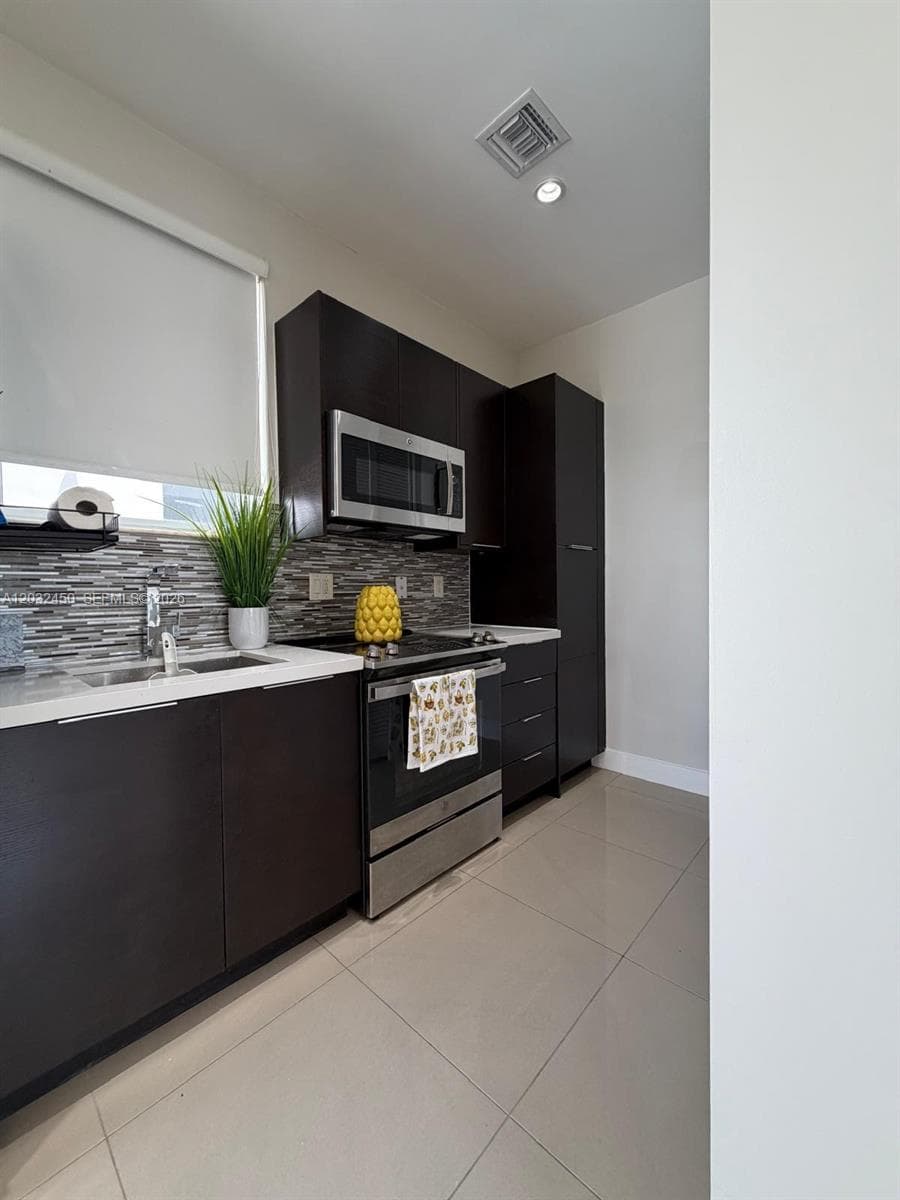6440 NW 103rd Psge # 6440, Doral FL 33178 — 8