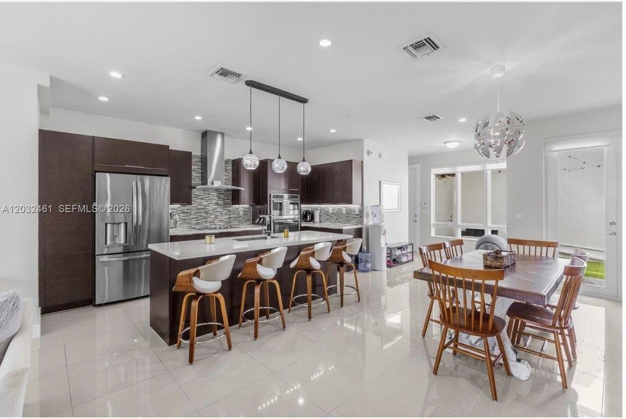 6440 NW 103rd Psge # 6440, Doral FL 33178 — 1