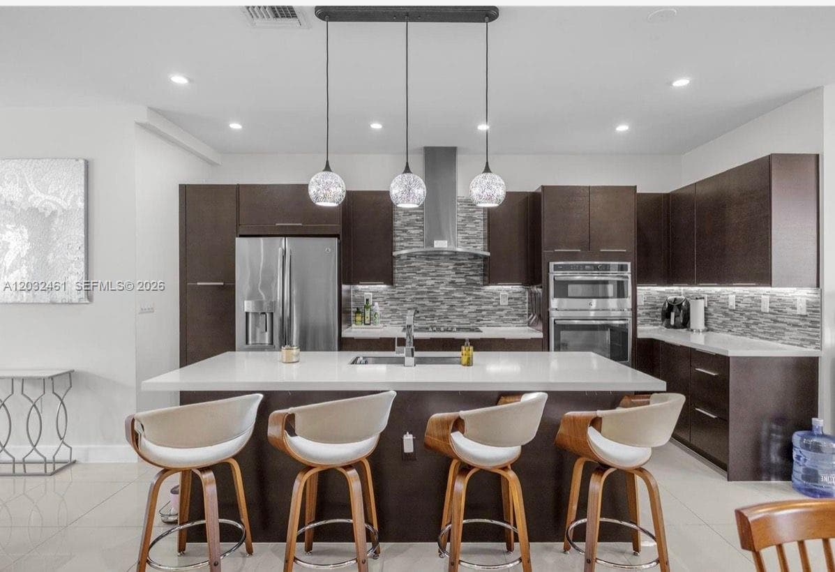 6440 NW 103rd Psge # 6440, Doral FL 33178 — 4