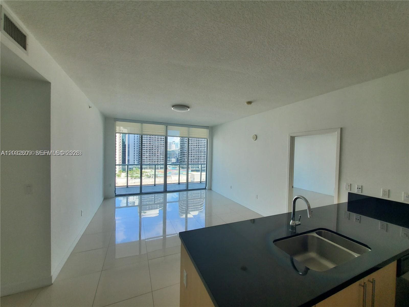 1111 SW 1  AVE, Miami FL 33130 — 2