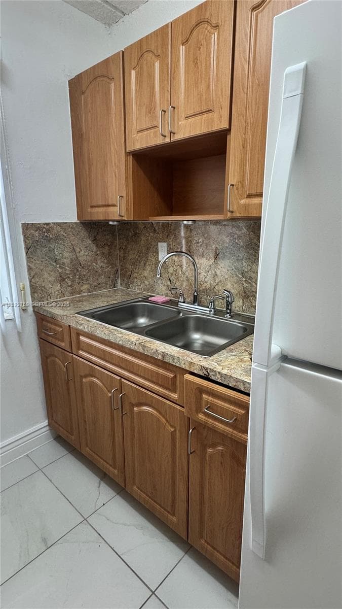 1154 W 35th St # 102, Hialeah FL 33012 — 8