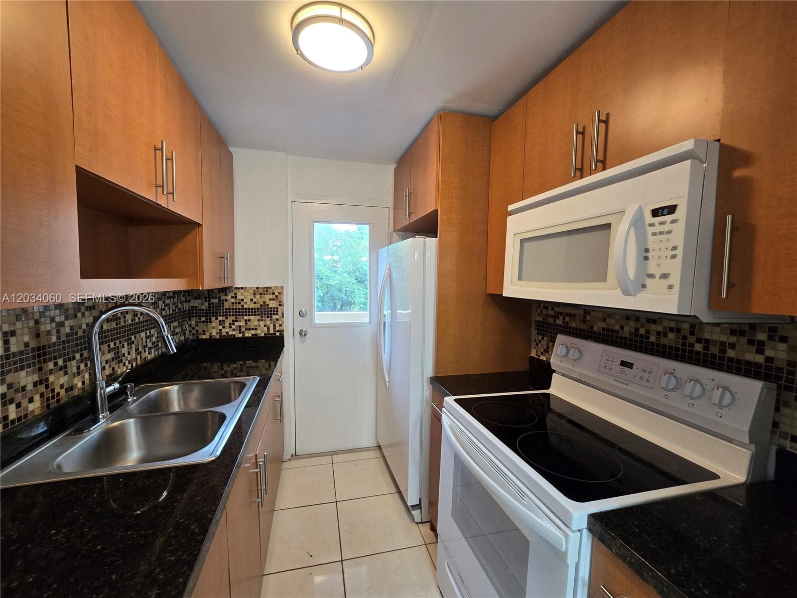 1475 NE 125th Ter # B, North Miami FL 33161 — 3