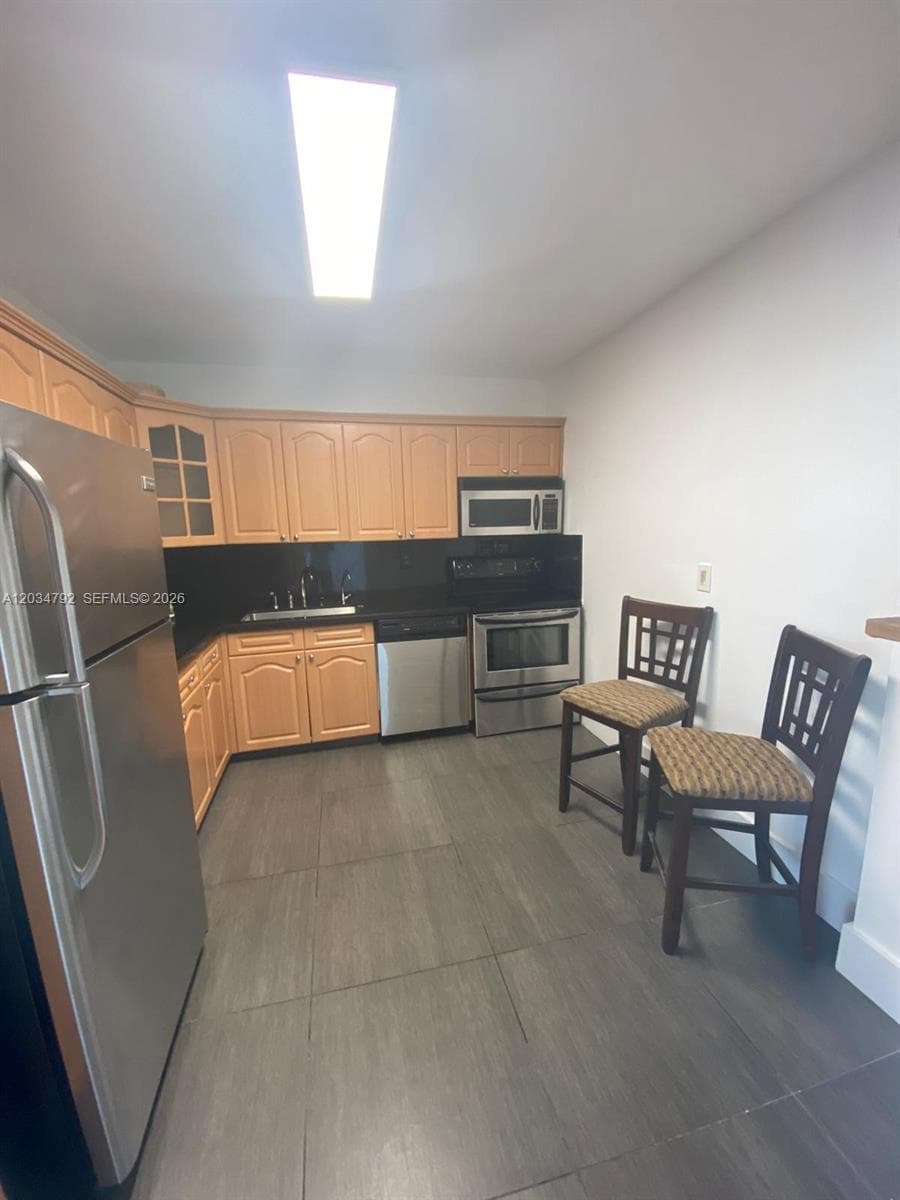 2450 NE 135th St # 1012, North Miami FL 33181 — 10